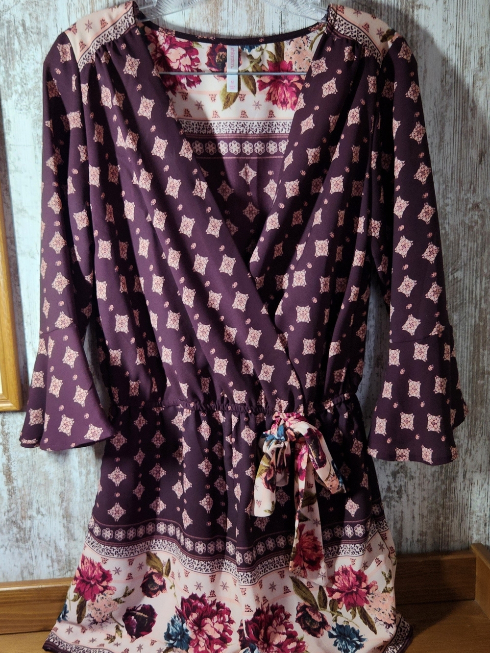 Xhilaration Boho Floral Border Print Wrap Romper with Bell Sleeves Size M Plum